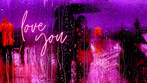 a couple holding an umbrella in the rain with the words `` love you '' written on the window .