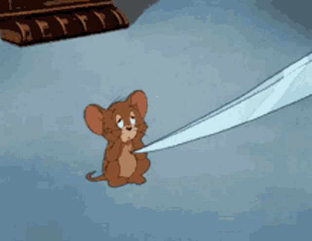 a cartoon mouse is tied to a piece of paper