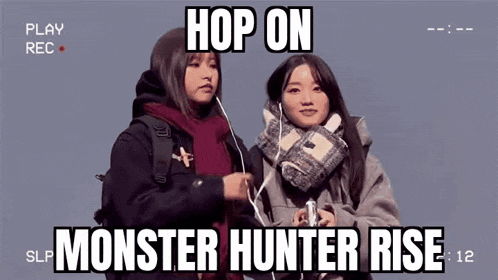 a couple of girls are standing next to each other with headphones on .