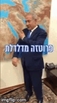 a man in a suit and tie is standing in front of a map with the words imgflip.com below him