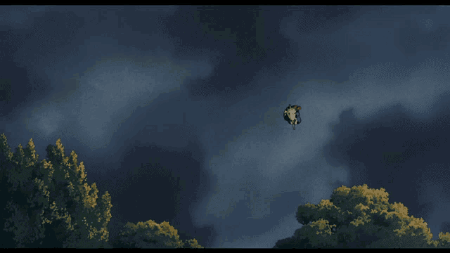 a bird is flying through a cloudy sky