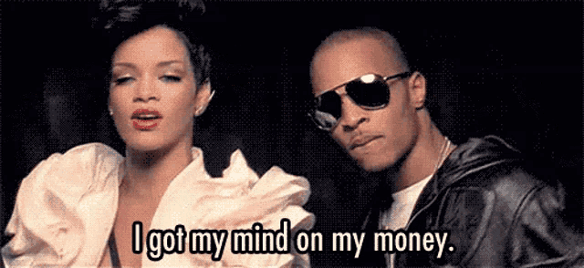a man and a woman are standing next to each other and the man says i got my mind on my money