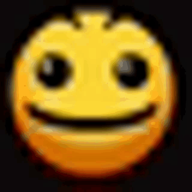 a blurry picture of a smiley face with a black background