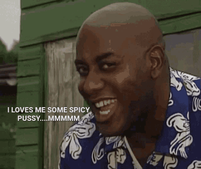 a bald man is smiling and says i loves me some spicy pussy ..