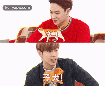 two young men are sitting next to each other on a couch and one of them is holding a dog on a leash .