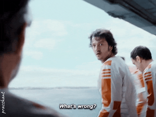 a man says what 's wrong in front of a group of men