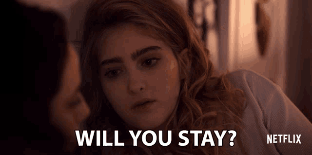 a netflix advertisement shows a woman asking if she should stay