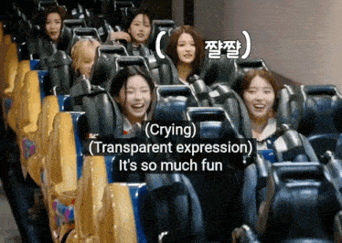 a group of girls are riding a roller coaster and one girl is crying and the other is laughing