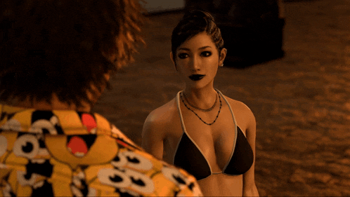 a woman in a bikini stands next to a man wearing a shirt with smiley faces