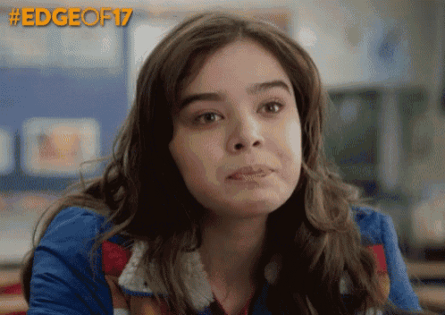 a close up of a woman 's face with the words edge of 17 on the bottom right