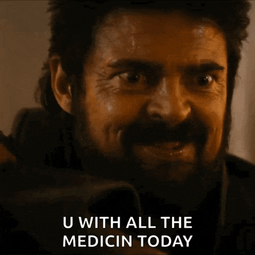 a man with a beard is smiling and says u with all the medicin today
