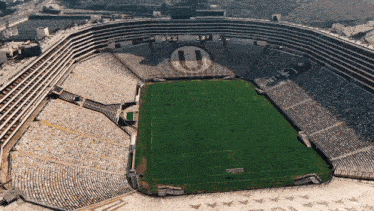 an aerial view of a soccer stadium with the letter u on the top of it