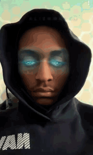 a man wearing a black hoodie that says jam on it