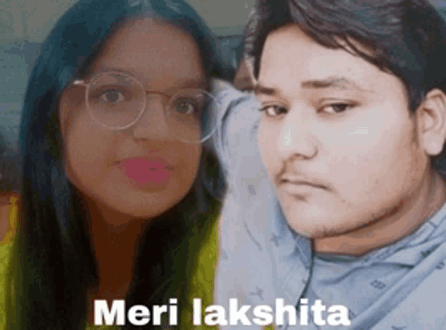 a man and a woman are standing next to each other with the words meri lakshita written on the bottom