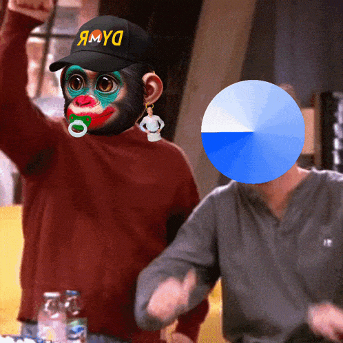 a monkey with a pacifier in its mouth wearing a hat that says amyd