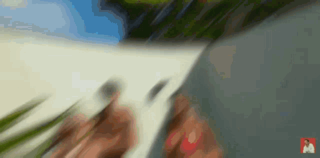 a blurred image of a person walking down a road