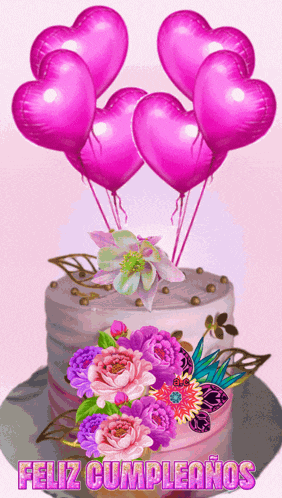 a birthday cake with pink balloons and flowers and the words feliz cumpleanos