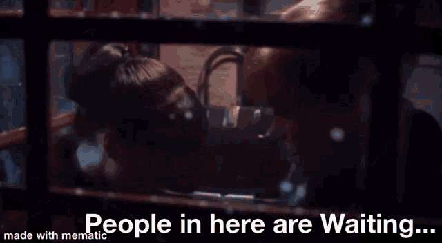 a woman with red hair is looking at another woman in a mirror and saying `` people in here are waiting ... ''