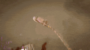 a computer generated image of a robot with purple lights