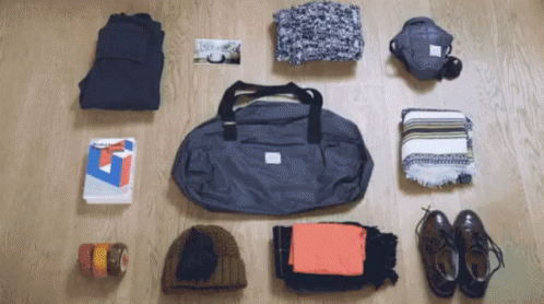 打包 行李 包包 收納 整理 GIF - Packing Luggage Duffel Bag GIFs