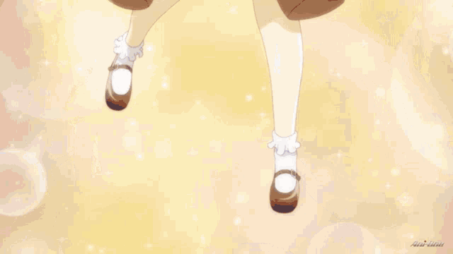 a close up of a girl 's skirt with sparkles on it