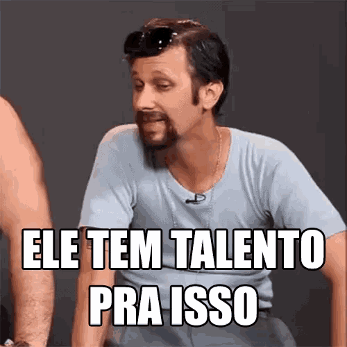a man with a beard is wearing sunglasses and says ele tem talento pra isso .
