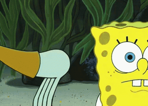spongebob and squidward are standing next to each other in the sand