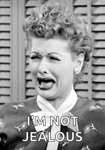 a black and white photo of a woman with the words i 'm not jealous below her