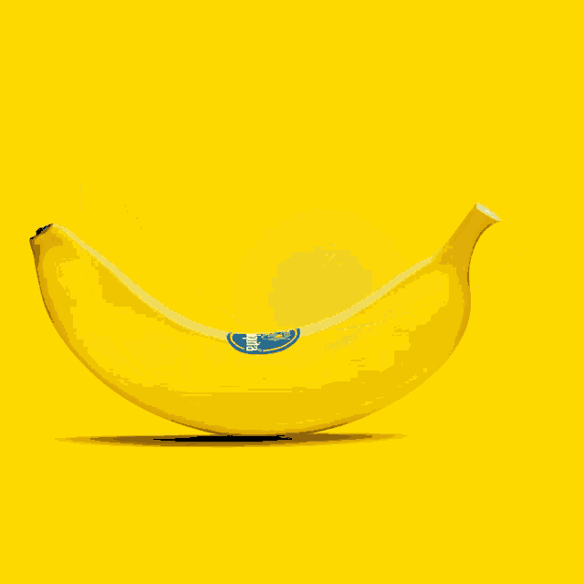 a yellow banana with a blue label that says ' zzz ' on it
