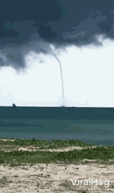 a video of a tornado coming out of the ocean is being shared on viralhog