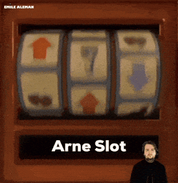 a man stands in front of a slot machine that says " arne slot "