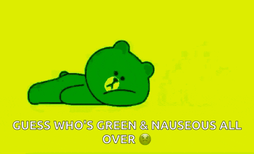 a green teddy bear is laying down on a yellow background with the words guess who 's green & nauseous all over