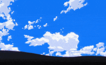 a blue sky with white clouds in it and a black hill in the foreground