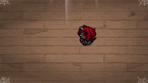 a pixel art drawing of a worm with blood coming out of it 's mouth