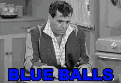 a black and white photo of a man with the words blue balls on the bottom