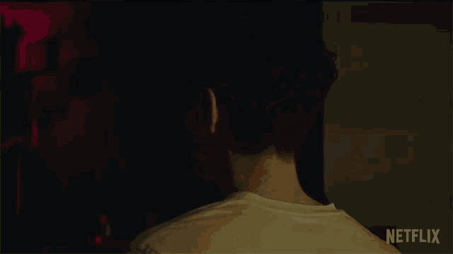 a close up of a man 's face with netflix written on the bottom right