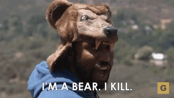 a man wearing a bear mask says " i 'm a bear i kill "