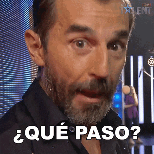 a man with a beard is making a funny face and says que paso