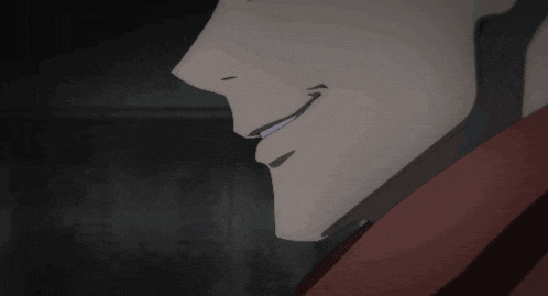 a close up of a person 's face with a smile