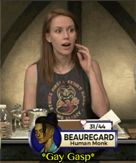 a woman sitting at a table with a sign that says beauregard