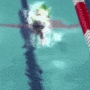 a blurred image of a cartoon character floating in the air .