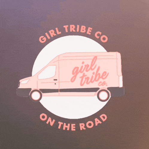 a pink van with the words girl tribe co. on the road