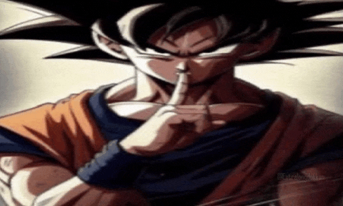 a close up of a dragon ball z character holding his finger to his lips .