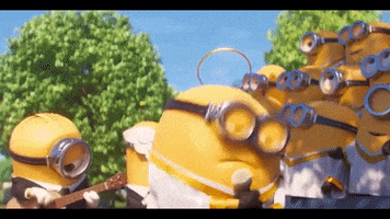 a group of minions are playing a guitar and singing in a park