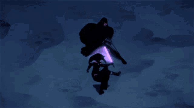 a purple light is being thrown at a person in a dark room