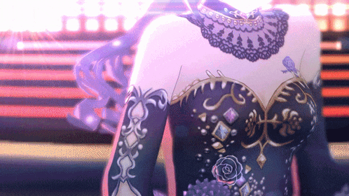 a close up of a woman 's back with a purple dress on