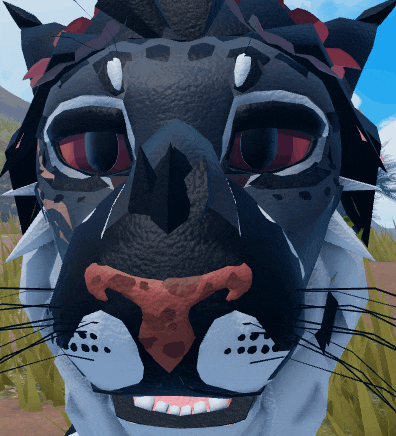 a close up of a leopard 's face with a red nose