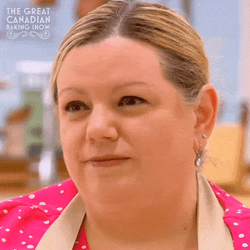 a woman is on the great canadian baking show and is smiling