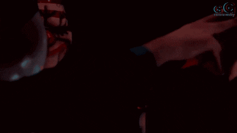 a man wearing a clown mask with an american flag painted on it