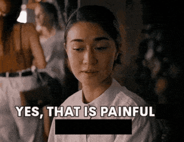 a woman says yes that is painful in front of a black box